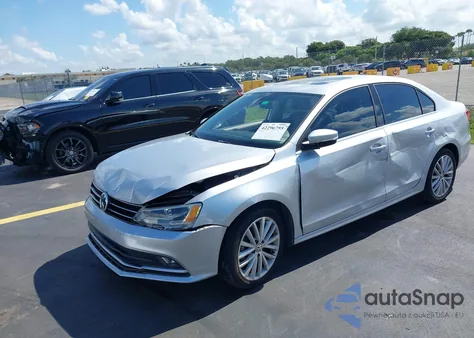 2015 Volkswagen Jetta 1.8T Se z USA, uszkodzony, nr VIN 3VWD07AJ5FM340040